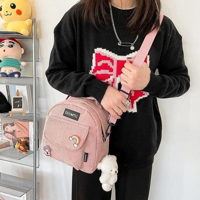 Backpack Stevvex pink ribbed mini with rainbow patch and plush bunny keychain on Tampa Home & Garden Store