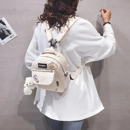 Backpack Stevvex small beige corduroy bag with front pocket patches and plush keychain on Tampa Home & Garden Store