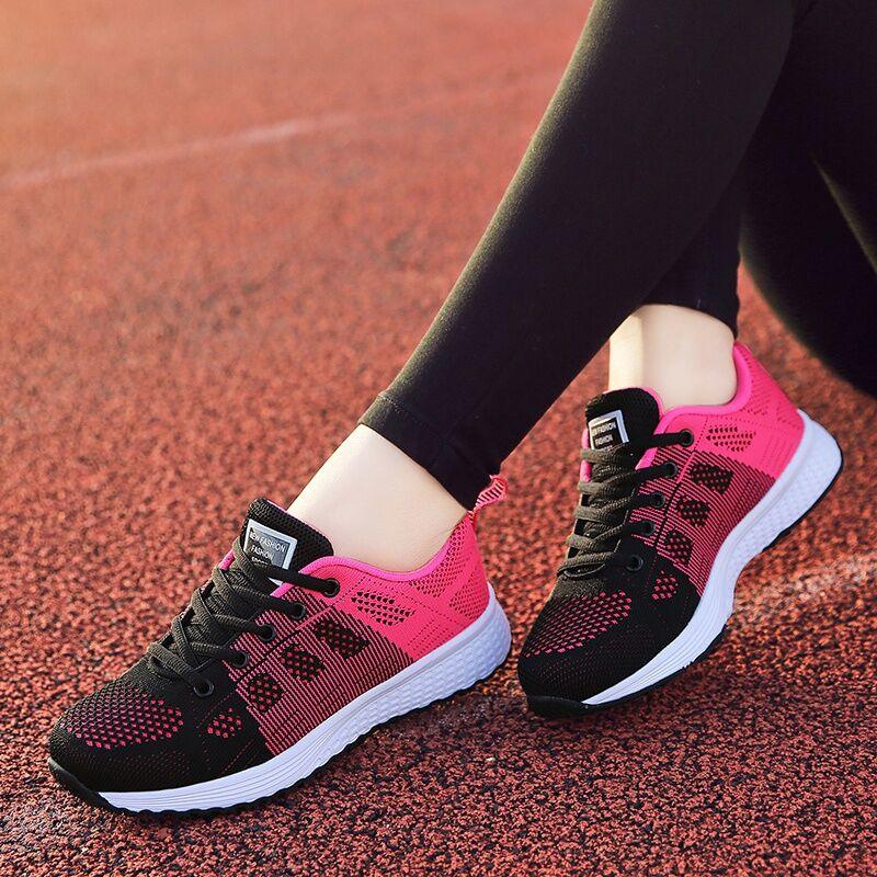 Women's pink black knit sneakers pair with white sole; breathable, non-slip walking shoes on Tampa Home & Garden Store