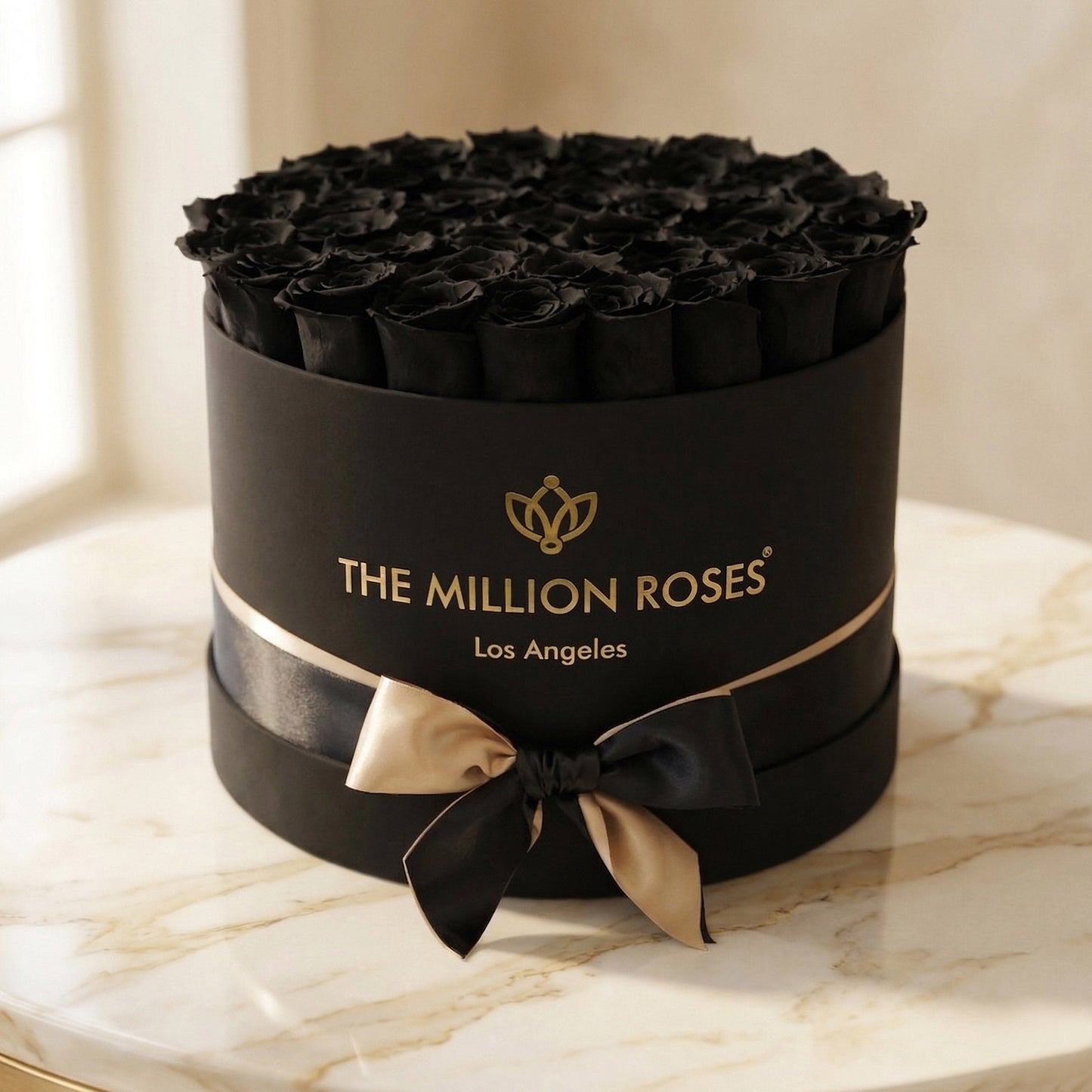 Supreme Black Box topped with black roses from The Million Roses in a matte black gift box on Tampa Home & Garden Store