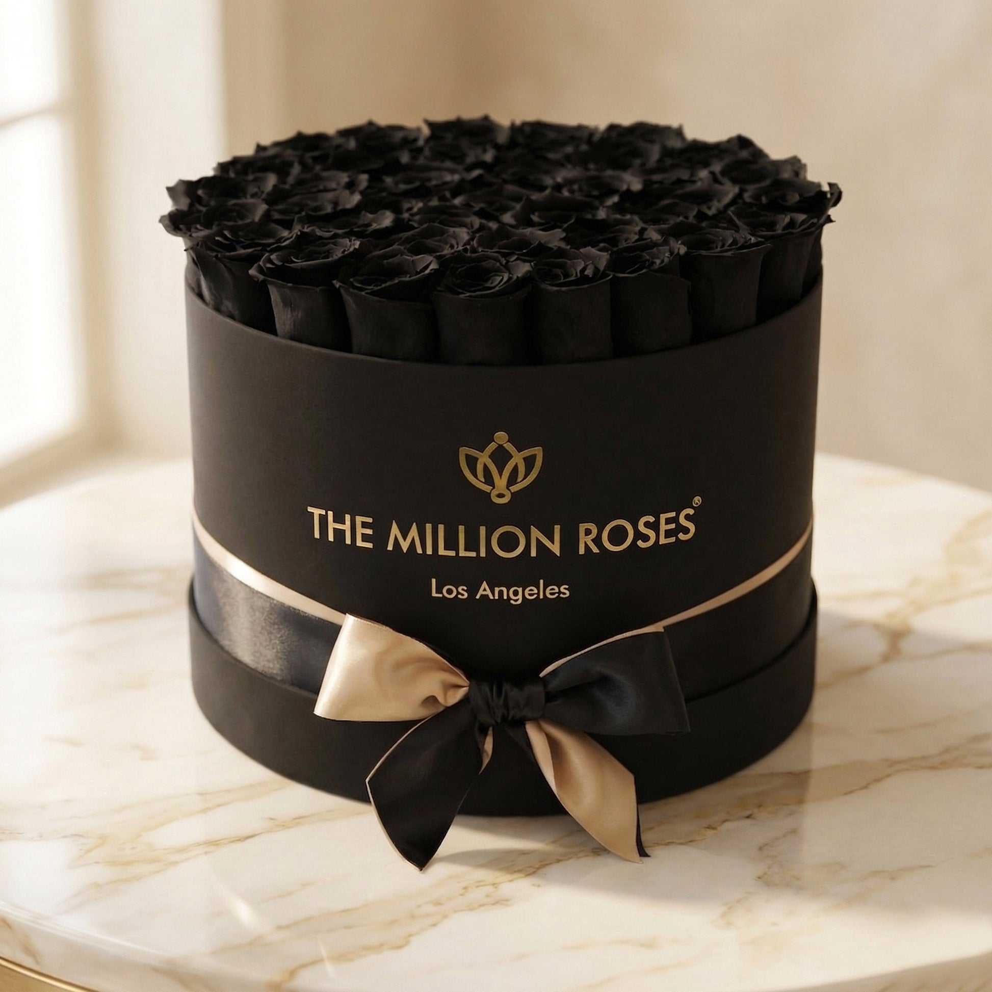 Supreme Black Box topped with black roses from The Million Roses in a matte black gift box on Tampa Home & Garden Store