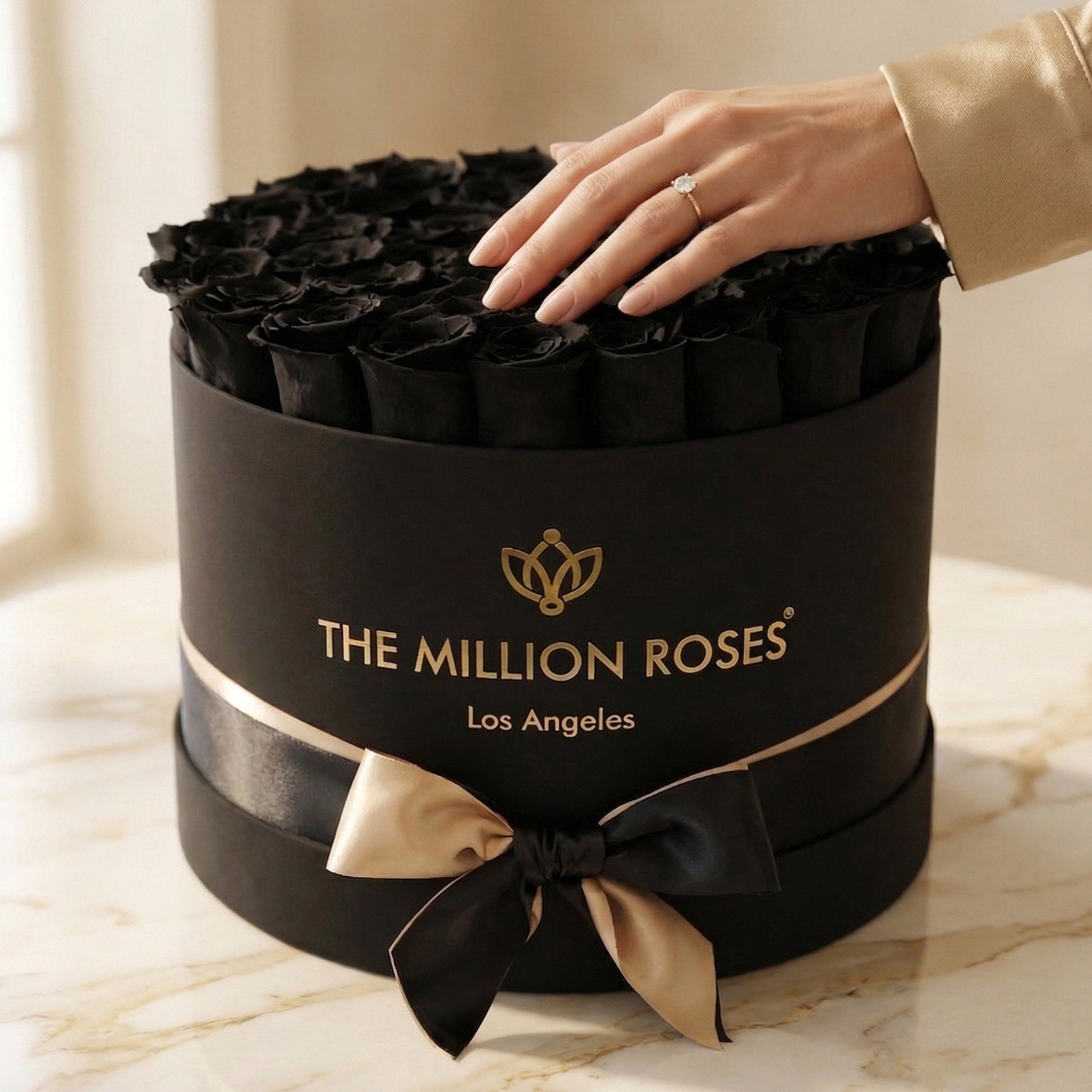 Supreme Black Box with black roses and a diamond ring; The Million Roses logo on the box on Tampa Home & Garden Store