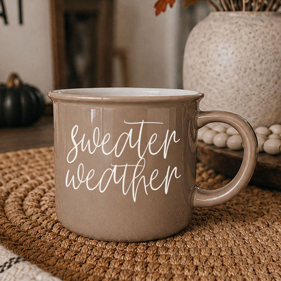 Sweater Weather coffee mug in taupe ceramic with white script lettering on Tampa Home & Garden Store