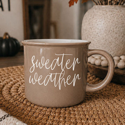 Sweater Weather coffee mug in taupe ceramic with white script lettering on Tampa Home & Garden Store