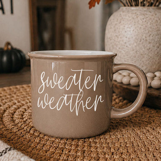Sweater Weather coffee mug in taupe ceramic with white script lettering on Tampa Home & Garden Store
