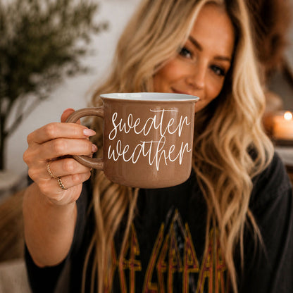 Sweater Weather coffee mug by Gia Roma in brown ceramic with white script text held by a hand on Tampa Home & Garden Store