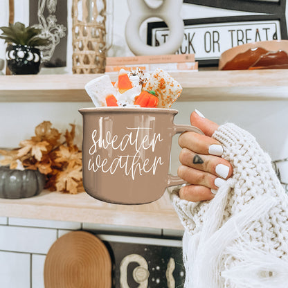 Coffee mug Sweater Weather by Gia Roma taupe mug topped with marshmallows and orange candy on Tampa Home & Garden Store