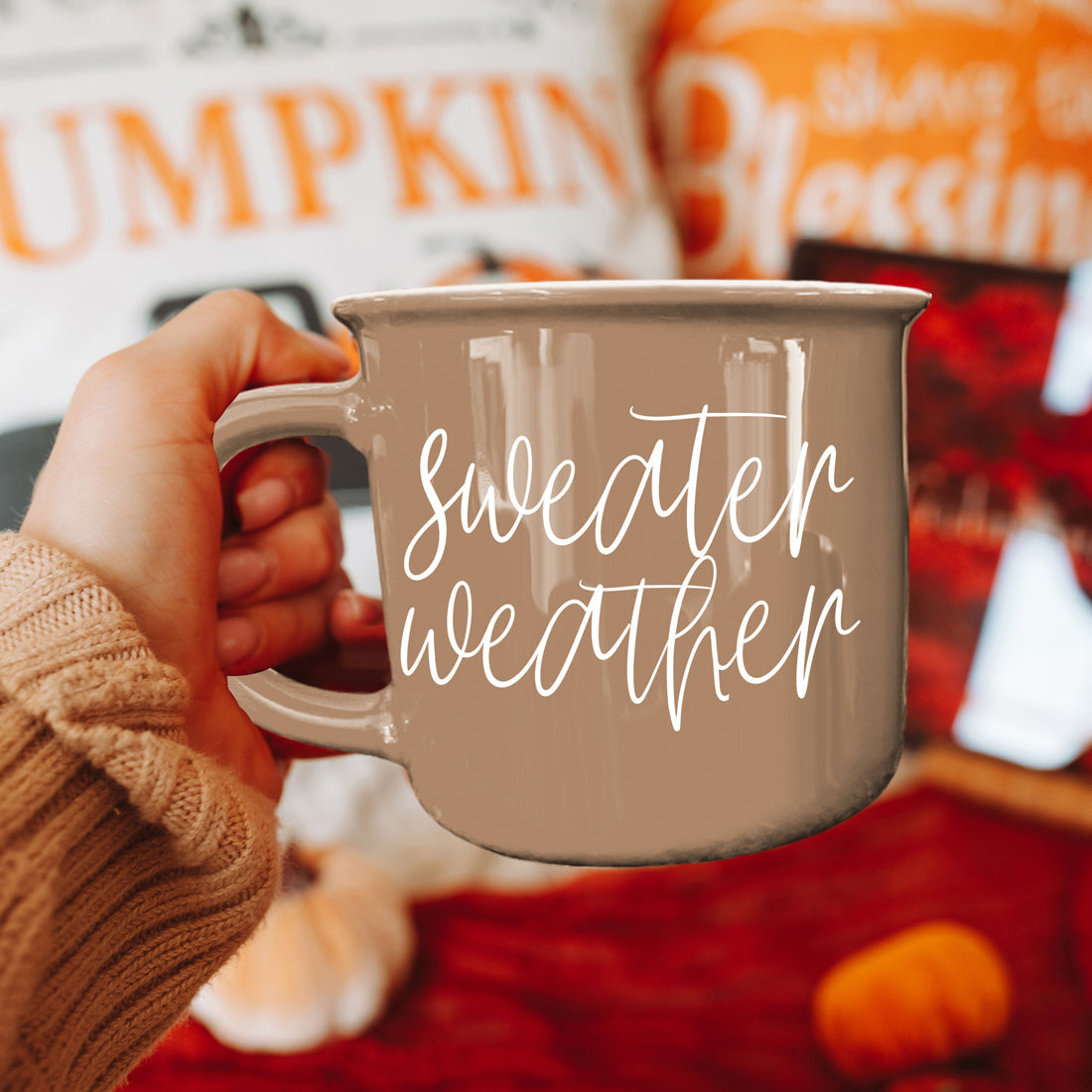 Coffee mug Sweater Weather by Gia Roma; taupe ceramic with white script, held in hand on Tampa Home & Garden Store