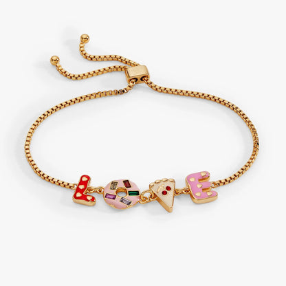 Sweet Shop Love Adjustable Bolo Bracelet in gold-tone with colorful enamel letter charms on Tampa Home & Garden Store