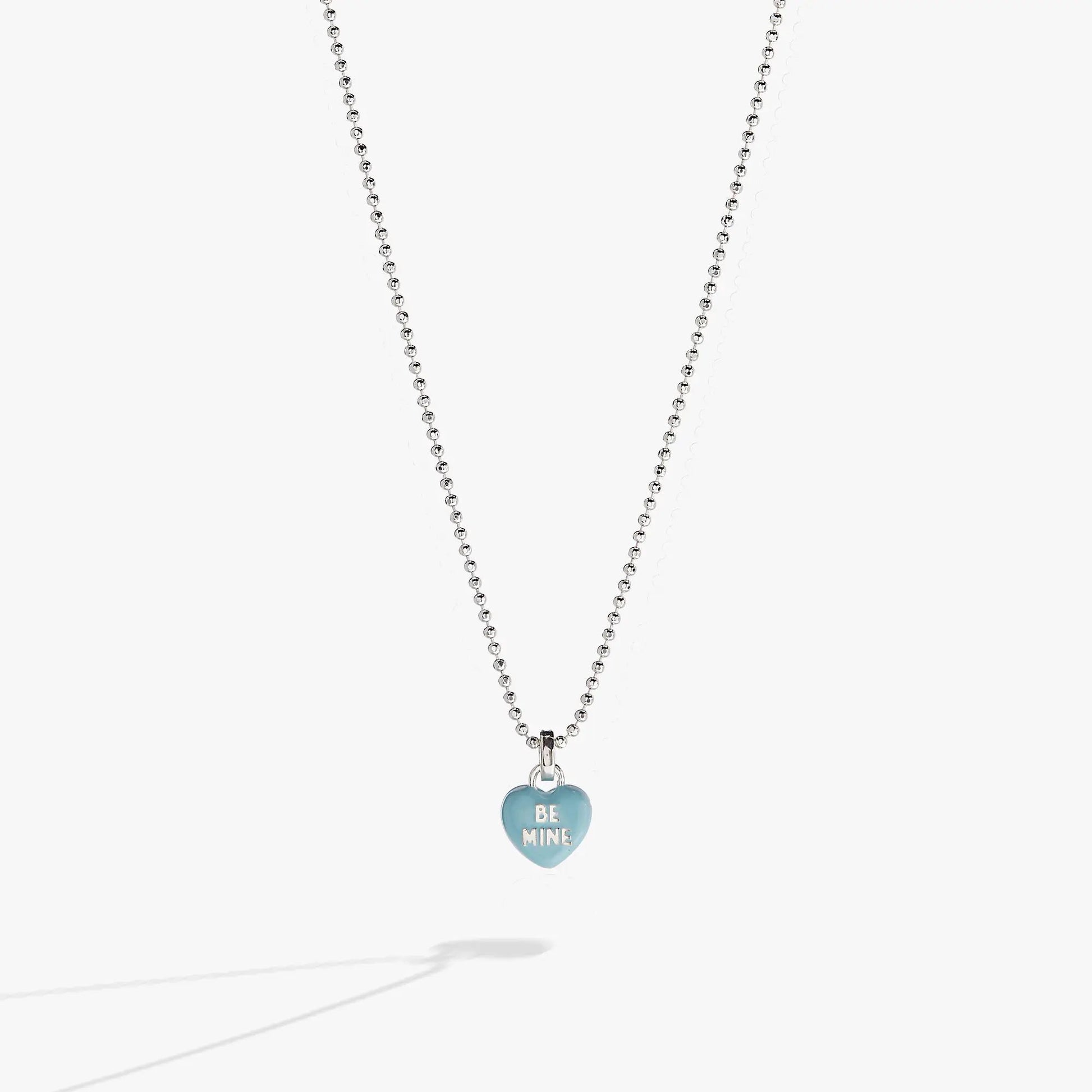 Sweethearts Be Mine pendant charm necklace by Alex and Ani on a silver bead chain with a blue heart pendant reading BE MINE on Tampa Home & Garden Store
