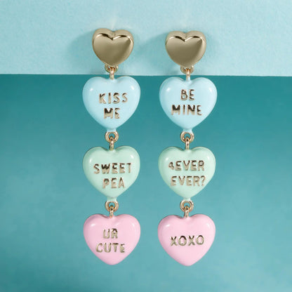 Sweethearts Statement Drop Earrings by ALEX AND ANI; gold-tone hearts with blue charms KISS ME on Tampa Home & Garden Store