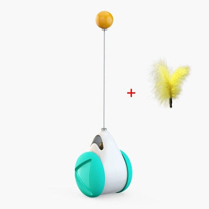 Stevvex 2-piece cat balance wheel toy with teal wheels and orange top; feather accessory on Tampa Home & Garden Store