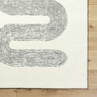 Saura Wool Area Rug by Boutique Rugs, beige with black looped dotted pattern on Tampa Home & Garden Store