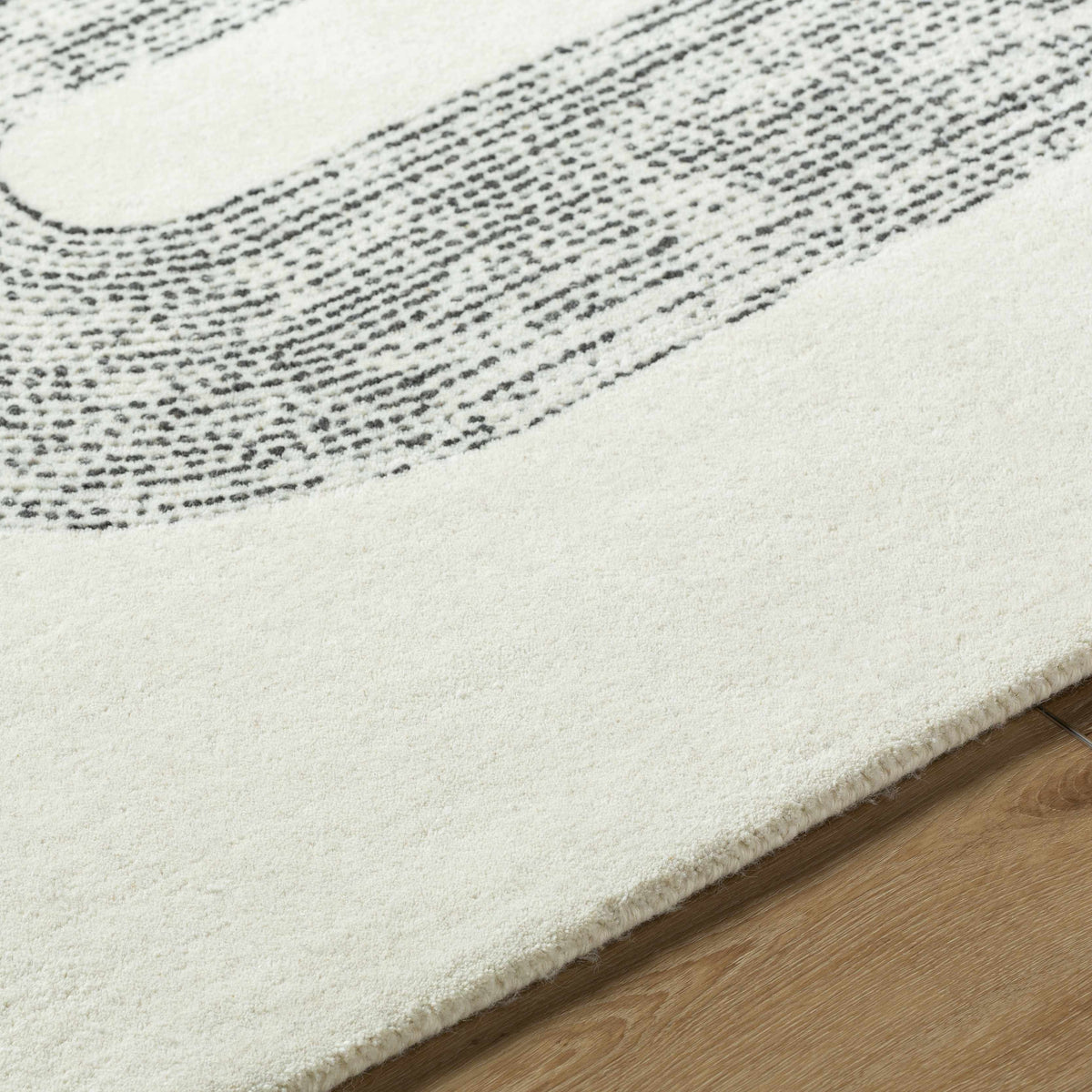 Saura Wool Area Rug cream with black pattern by Boutique Rugs, wool pile rug on Tampa Home & Garden Store