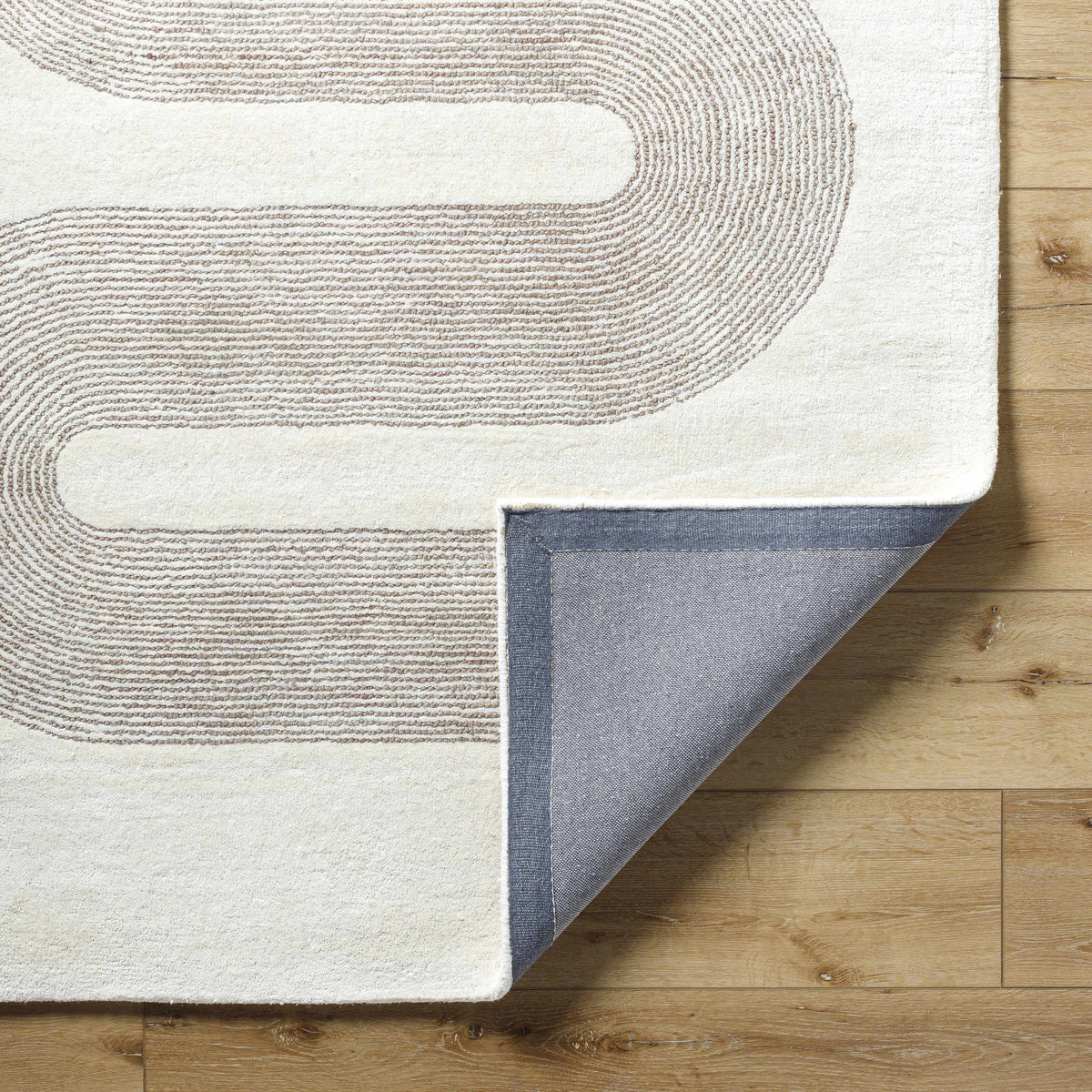 Saura Area Rug cream with taupe circular pattern by Boutique Rugs on Tampa Home & Garden Store