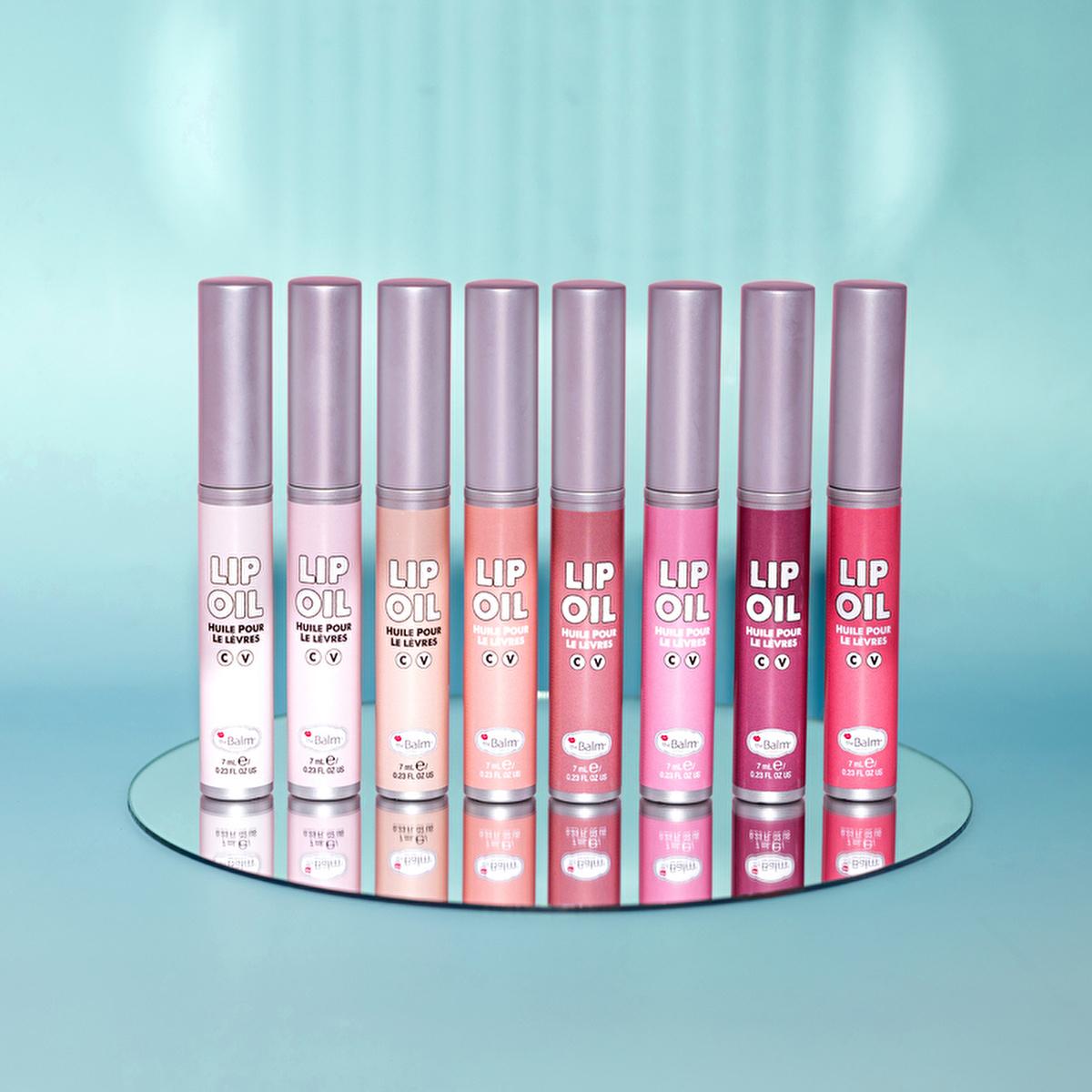theBalm Little Red Corvette Lip Oil nine lip oils in pinks to magenta on a mirror on Tampa Home & Garden Store