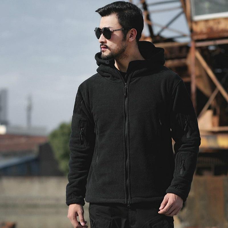 Stevvex black tactical jacket with hood and multiple pockets for outdoor hiking and training on Tampa Home & Garden Store