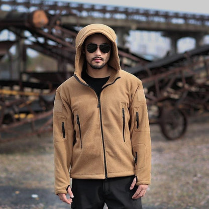 Stevvex tan hooded tactical jacket with multiple zip pockets and front zip for outdoor use on Tampa Home & Garden Store