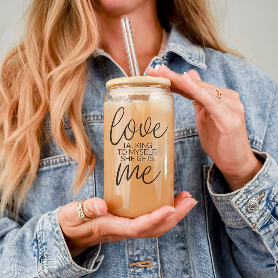 Love Me 20oz Gia Roma glass cup with cork lid and clear straw holding a beige iced drink on Tampa Home & Garden Store