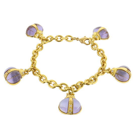 Lady Poof Bracelet by Lauren G Adams: gold-tone charm bracelet with five lilac globe charms on Tampa Home & Garden Store