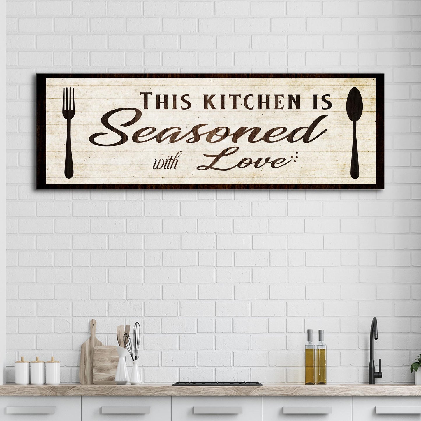 Kitchen Seasoned With Love canvas sign with beige distressed background and black frame on wall on Tampa Home & Garden Store