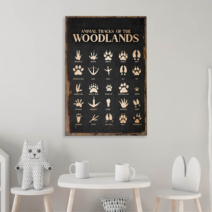 Animal Tracks Of The Woodlands Sign II canvas with a black background and beige track icons on Tampa Home & Garden Store