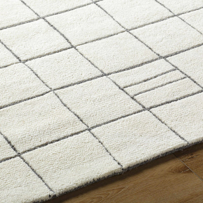 Tanya Pearl White Grid Wool Rug by Boutique Rugs, cream with charcoal grid lines on white field on Tampa Home & Garden Store