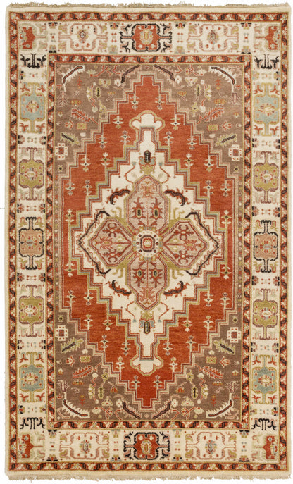 Texico Area Rug by Boutique Rugs in rust, cream with central geometric medallion on Tampa Home & Garden Store