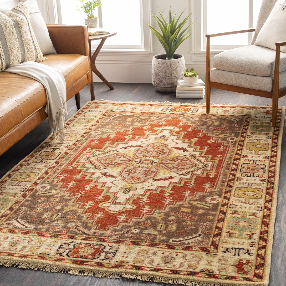 Texico Area Rug Boutique Rugs clearance with red cream geometric motif in living room on Tampa Home & Garden Store