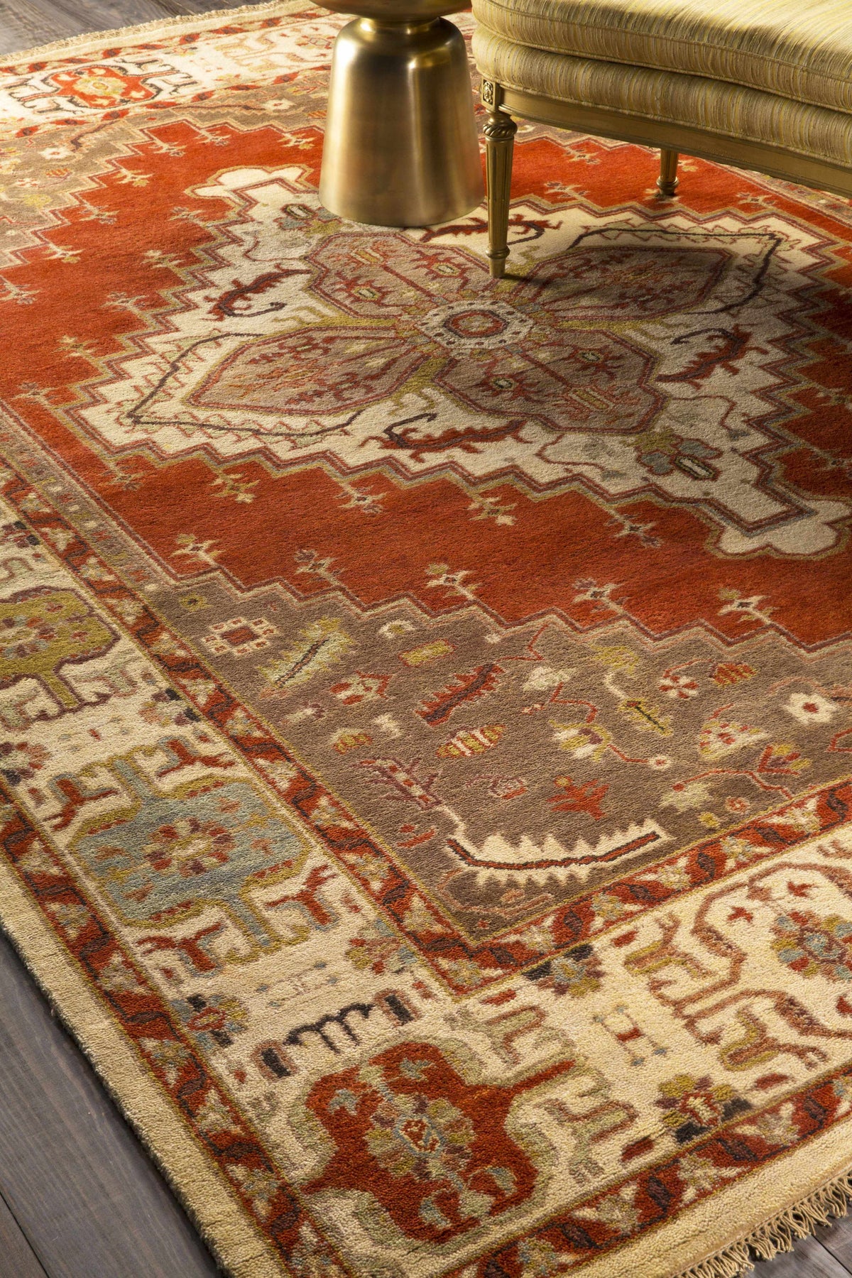 Texico Area Rug by Boutique Rugs, warm red and beige geometric medallion with zigzag border on Tampa Home & Garden Store