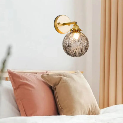 Textured Glass Ball Wall Light with Elegant Gold Wall Mount and Adjustable Joint
