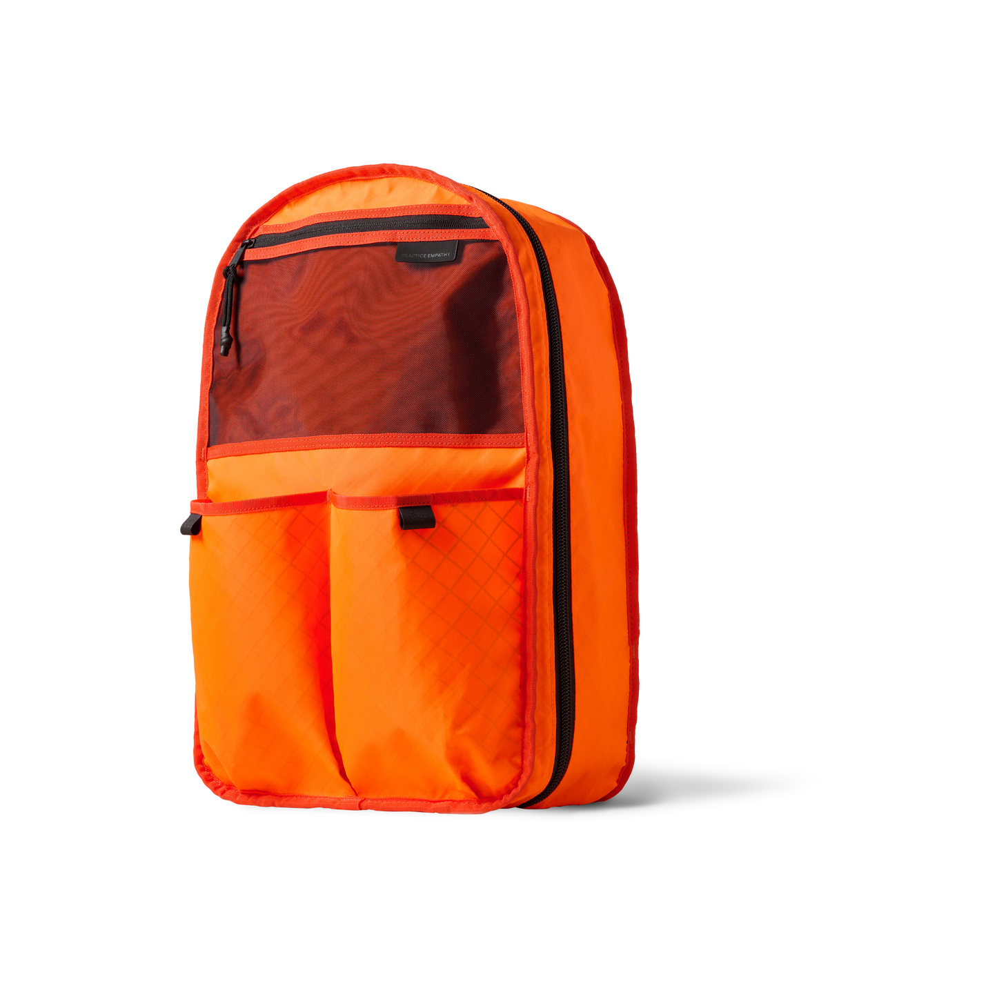 Conceal Pack 21L orange backpack by The Brown Buffalo with front mesh pocket on Tampa Home & Garden Store