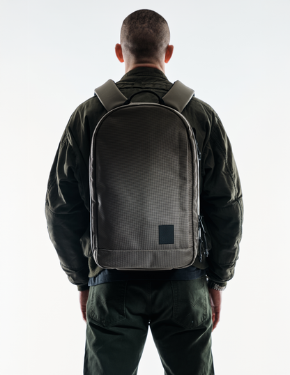 Conceal Pack 21L backpack by The Brown Buffalo in olive-brown fabric, back view on Tampa Home & Garden Store