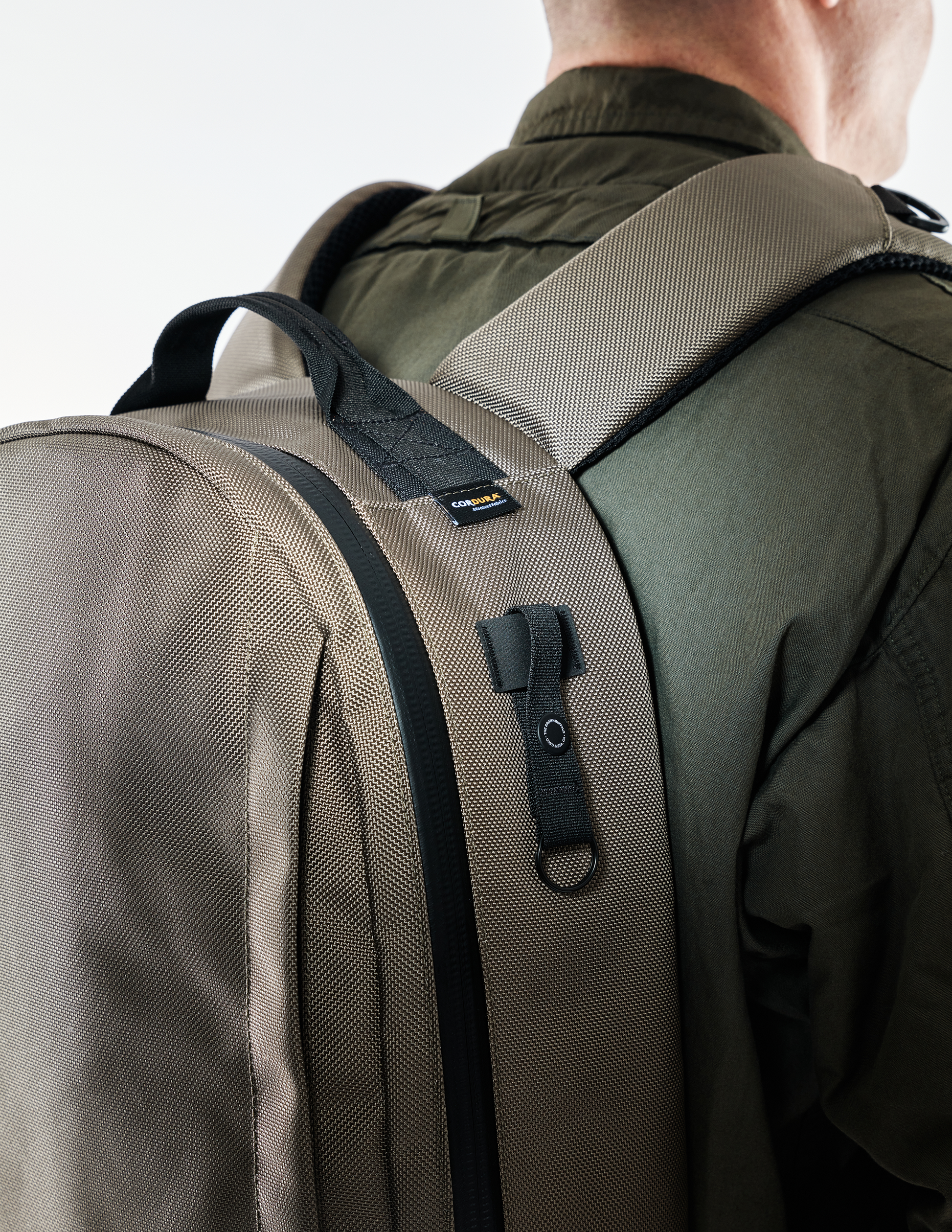 Conceal Pack 21L backpack in tan Cordura fabric with padded shoulder straps on Tampa Home & Garden Store