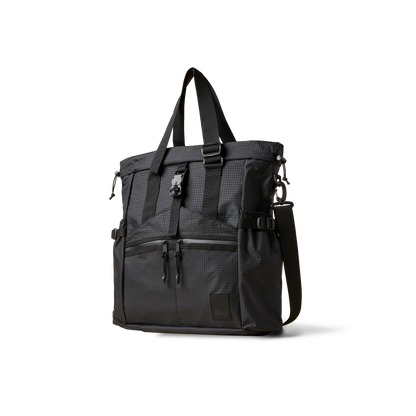 Conceal Tote by The Brown Buffalo, dark gray tactical tote with multiple straps and pockets on Tampa Home & Garden Store