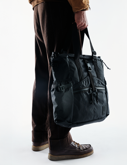 Conceal Tote The Brown Buffalo, dark gray tactical tote with buckles on Tampa Home & Garden Store