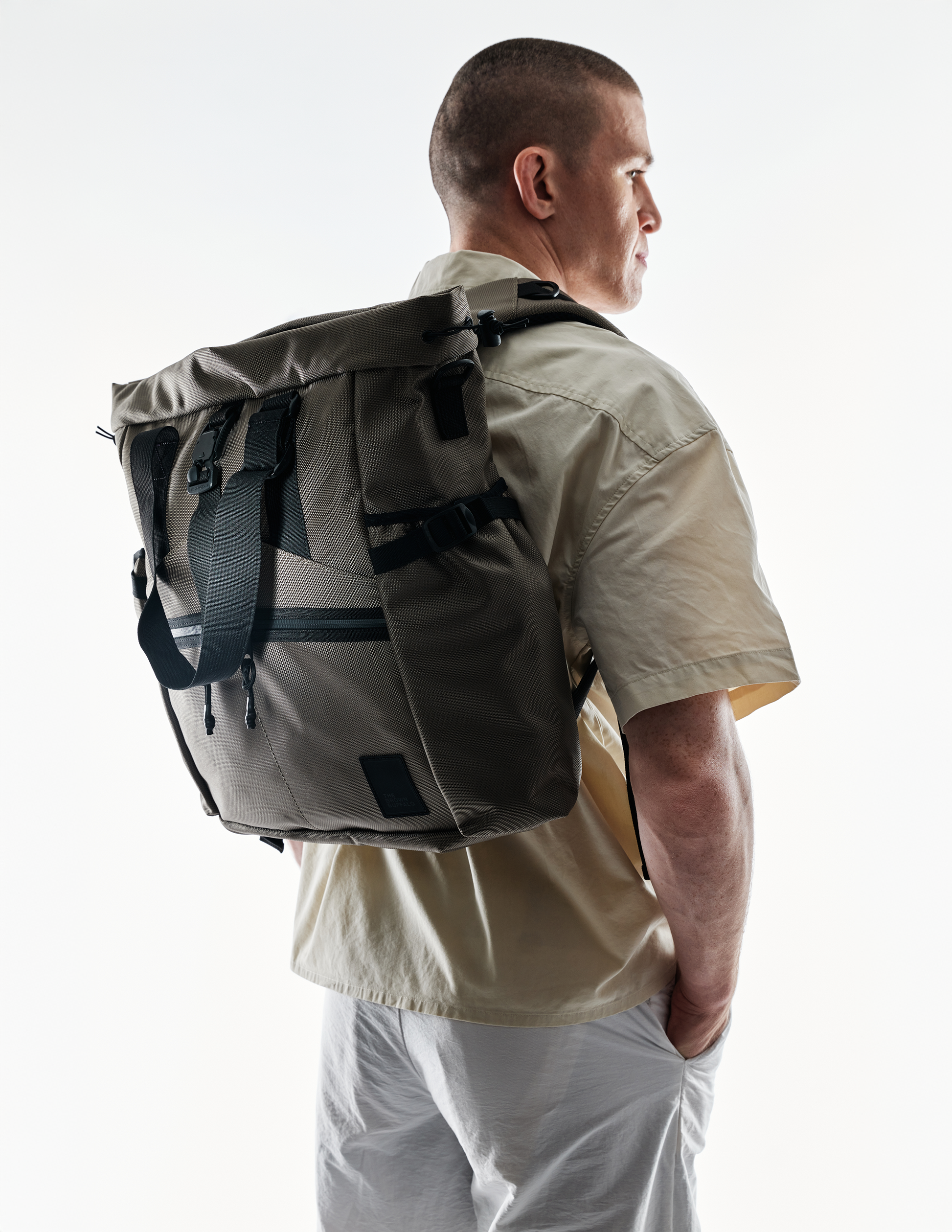 Conceal Tote backpack in brown tactical fabric with multiple straps by The Brown Buffalo on Tampa Home & Garden Store