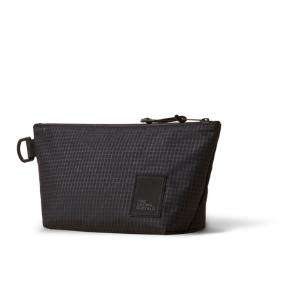 Dopp Kit toiletry bag by The Brown Buffalo in dark gray grid fabric with zip closure on Tampa Home & Garden Store
