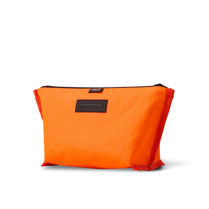 Orange Dopp Kit toiletry bag by The Brown Buffalo with zipper closure on Tampa Home & Garden Store