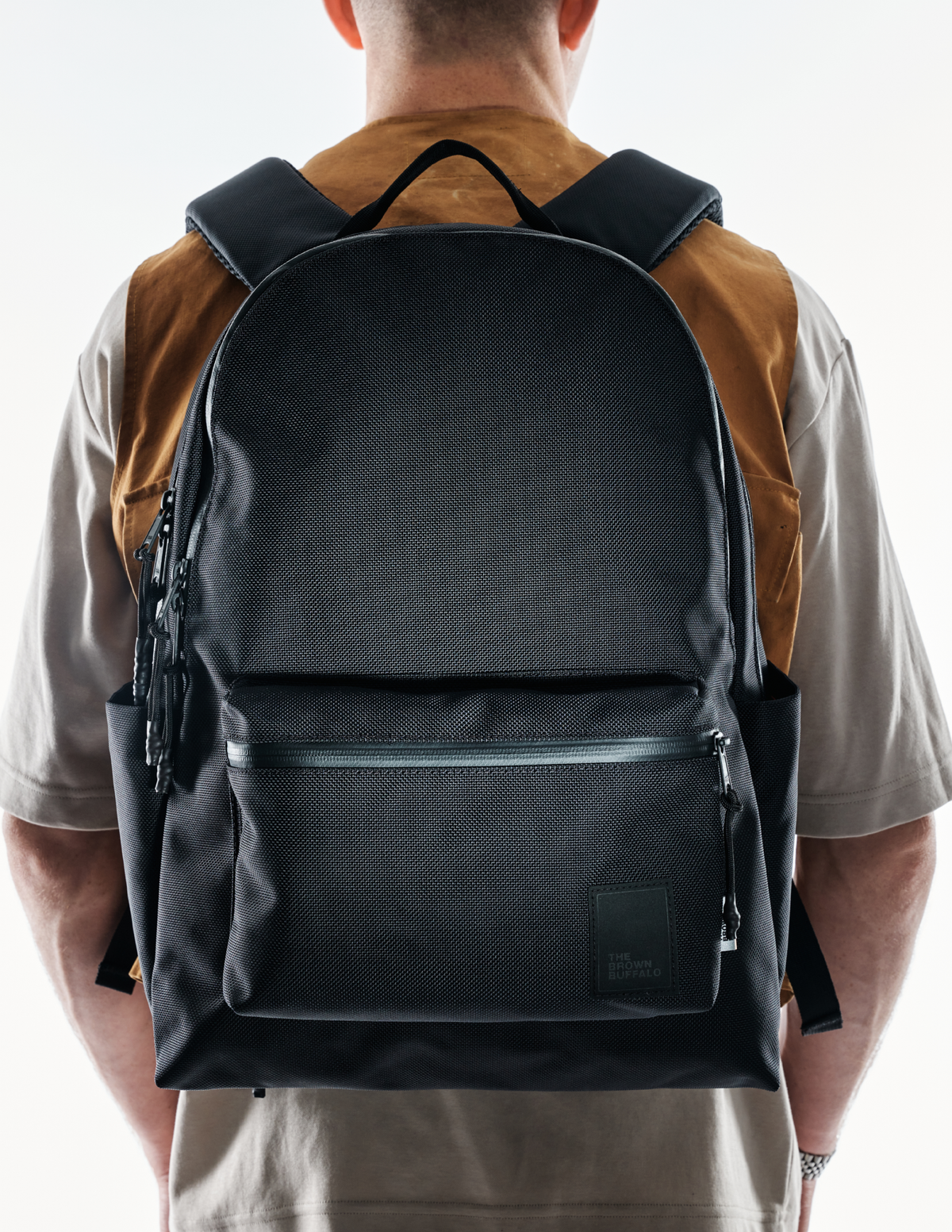 Backpack The Brown Buffalo Standard Issue in black with padded shoulder straps on Tampa Home & Garden Store