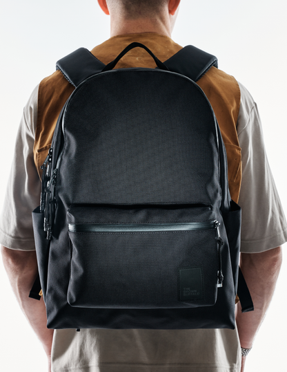 Backpack The Brown Buffalo Standard Issue in black with padded shoulder straps on Tampa Home & Garden Store