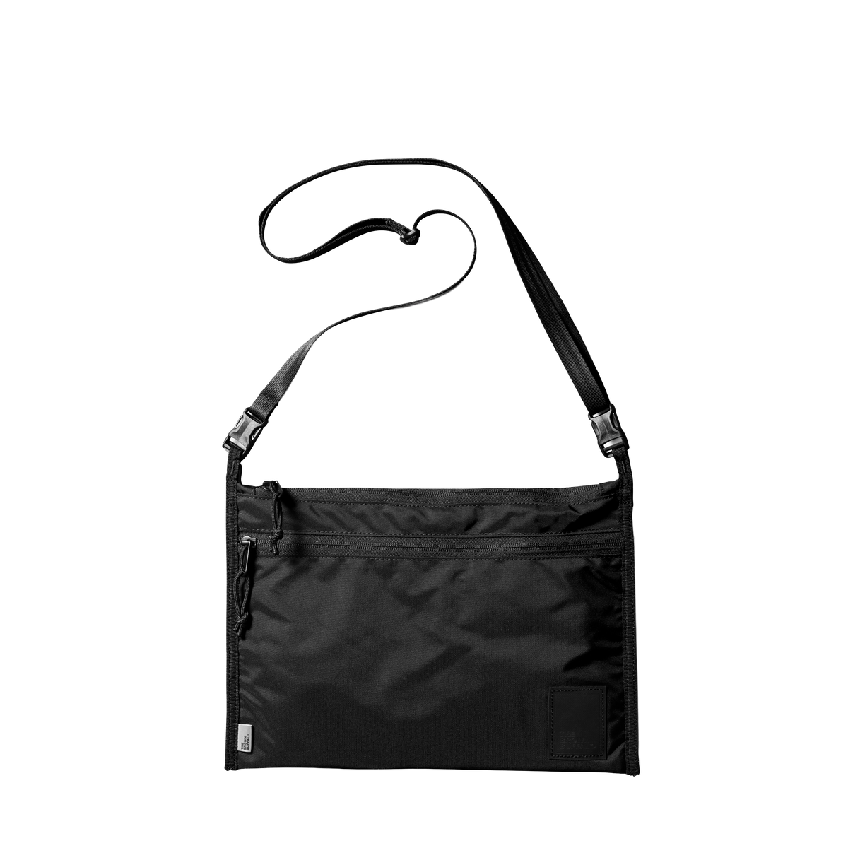 Packersling crossbody bag by The Brown Buffalo in black nylon with multiple pockets on Tampa Home & Garden Store