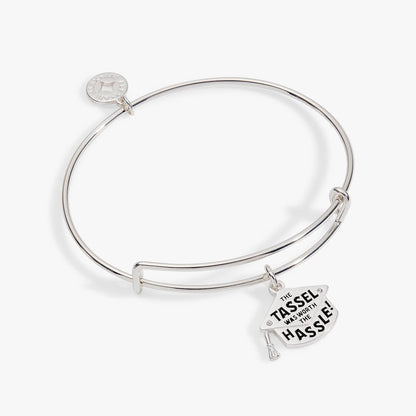 ALEX AND ANI silver charm bangle with two stacked The Tassel Was Worth The Hassle tags on Tampa Home & Garden Store