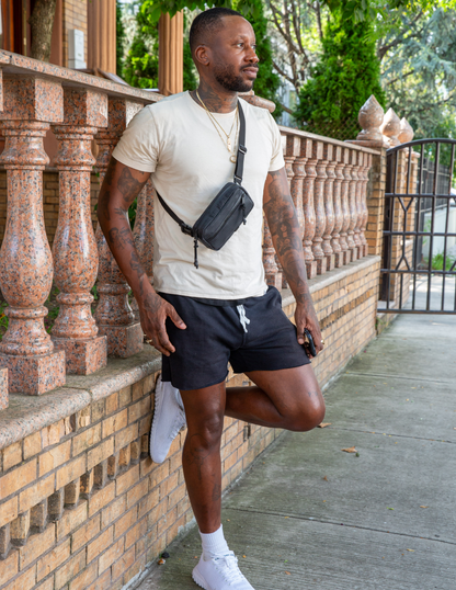 Conceal Waistpack The Brown Buffalo black nylon waist bag worn crossbody on Tampa Home & Garden Store