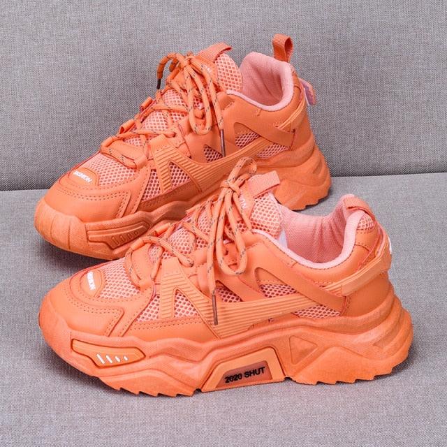 Stevvex orange chunky platform sneakers pair with mesh panels and lace-up front on Tampa Home & Garden Store