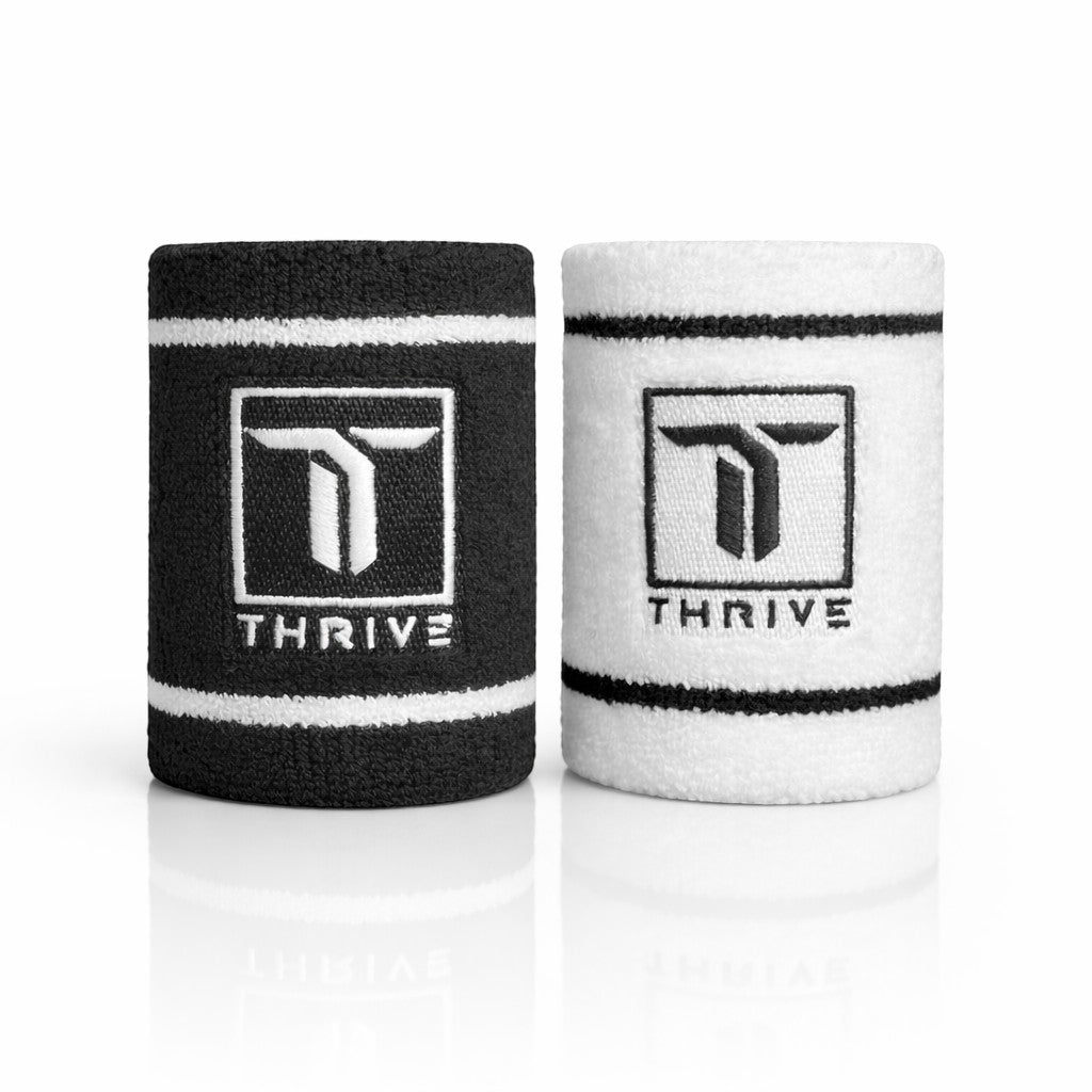Thrive Classic Wristbands 2-pack in black and white with Thrive logo on Tampa Home & Garden Store