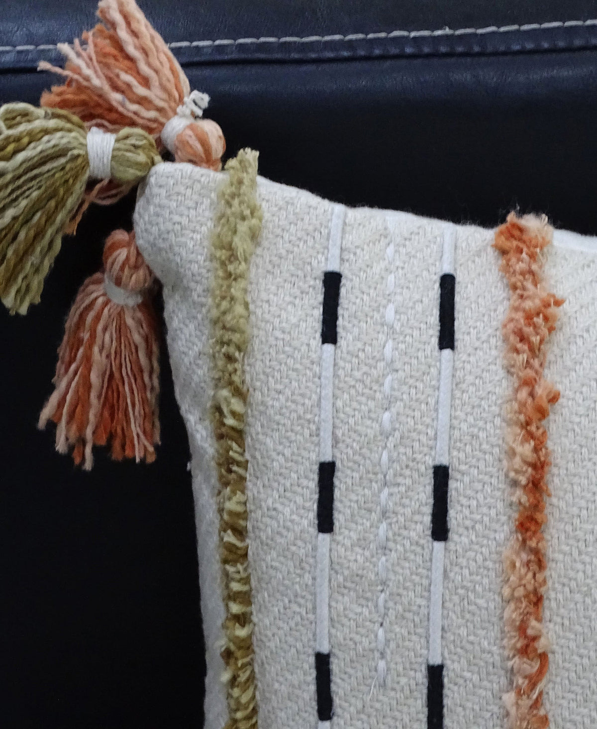 Vibhsa lumbar pillow, handwoven multicolor, 14x24, cream with black stripes and colorful tassels on Tampa Home & Garden Store