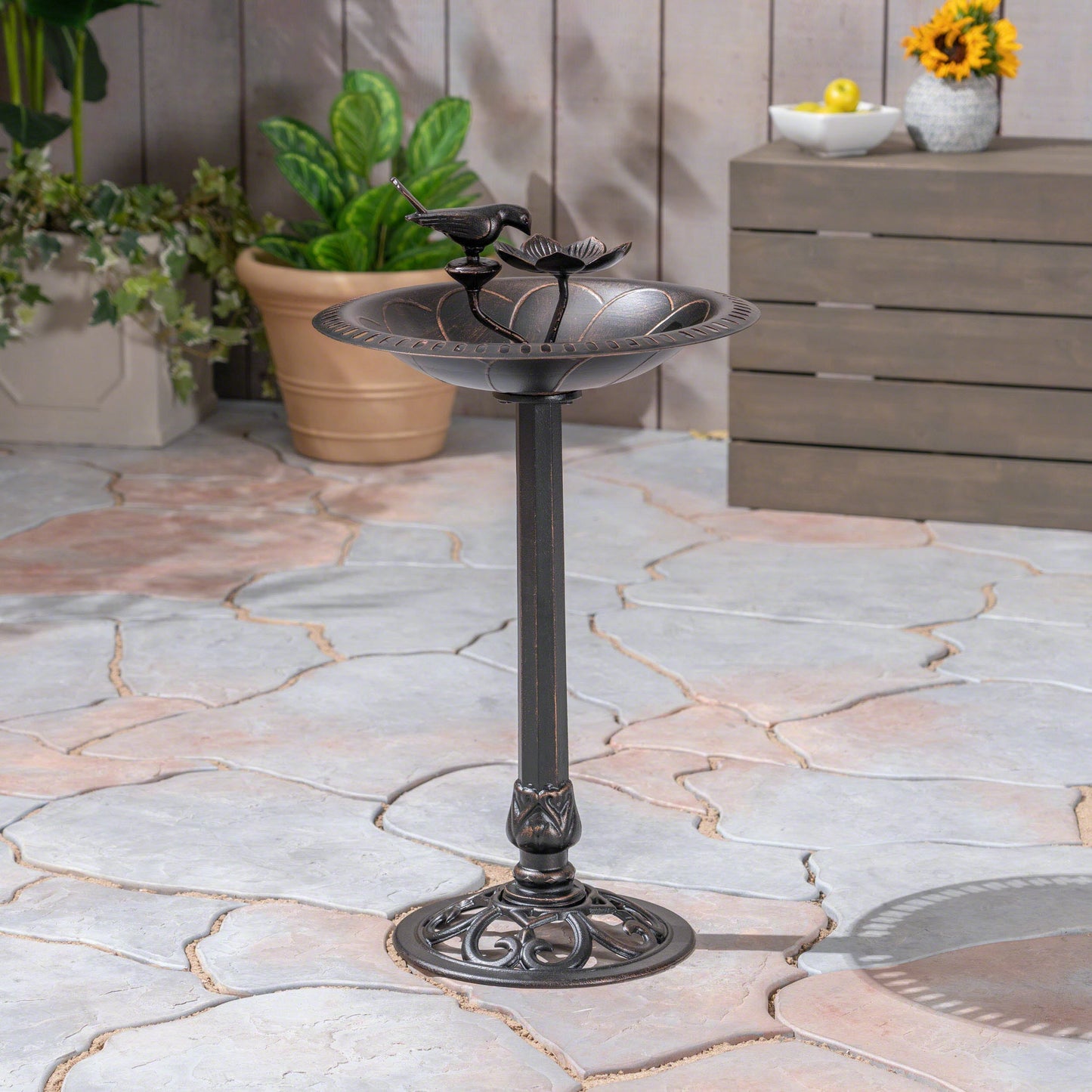 Outdoor aluminum and iron bird bath by HouseOfZazla, dark metal with bird and leaf details on Tampa Home & Garden Store