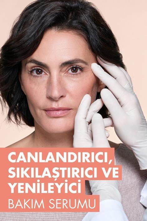 Avene DermAbsolu Anti-Aging Facial Serum for loss of firmness & elasticity; model with white gloves against a peach backdrop on Tampa Home & Garden Store