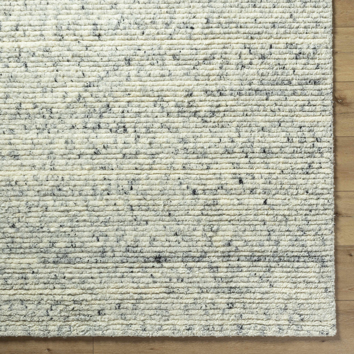 Torie Green NZ Wool Area Rug in cream with a chunky loop pile and dark flecks Boutique Rugs on Tampa Home & Garden Store